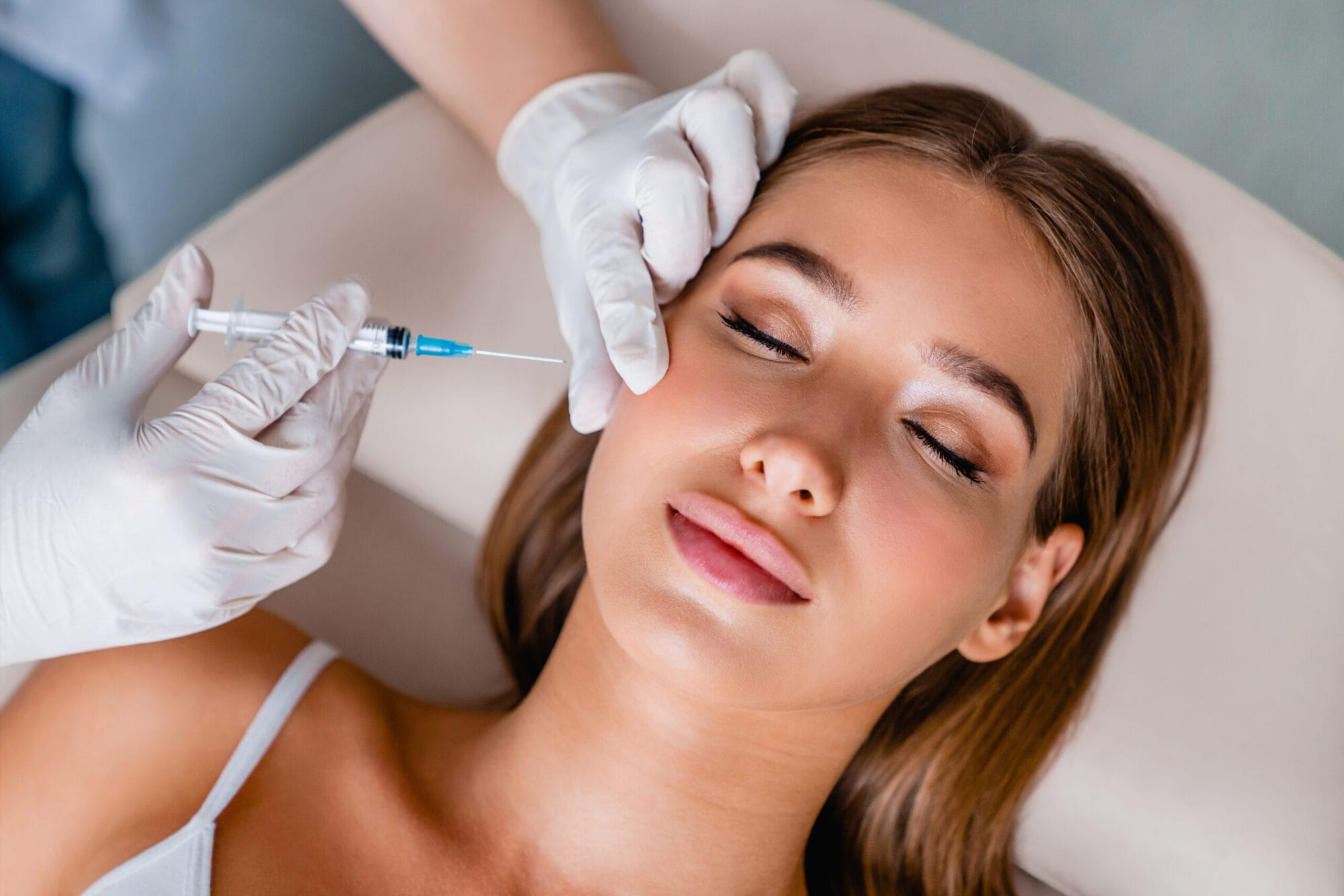 Young woman gets Dermal Filler injection | Uptown Aesthetics And Wellness in Martinsville, VA