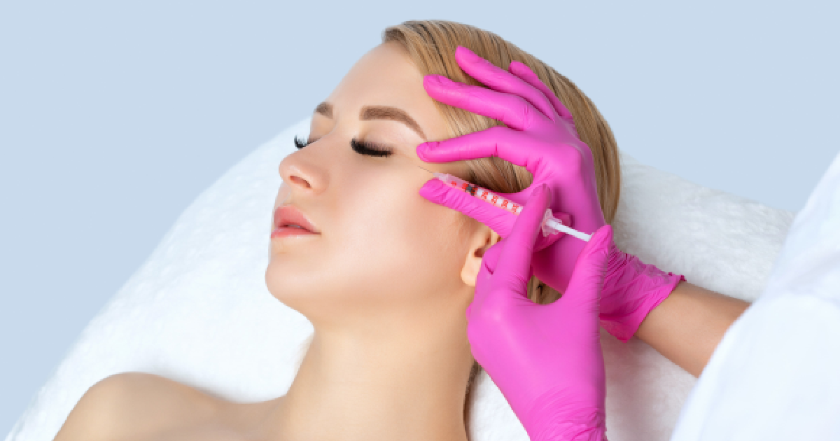 Woman receiving Anti-Wrinkle Injections in Martinsville, VA from a licensed professional wearing pink gloves